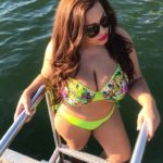 Costina Ana-Maria Munteanu - @costina​_got_curves - a plus size model wearing neon plus size two piece swimsuit by @miraclewomanonline