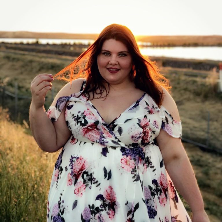 Melissa Jantina - Plus size model wearing a plus size flower dress
