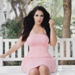 Holly Luyah (@luyah) a Curvy Plus Size Model wearing a pink dress from @fashionnova