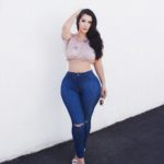 Holly Luyah (@luyah) a Curvy Plus Size Model wearing plus size jeans and a pink sheer top from @fashionnova