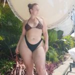 Curvy plus size fitness model Nicole Herring aka @nlhfit modeling a two piece bikini
