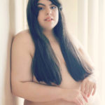 Moet Cristal is a plus size model, artist and photographer