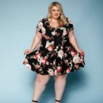 Lyndsay Patricia (aka PlusSizeBarbiiee) - plus size model - wearing a plus size black flower dress