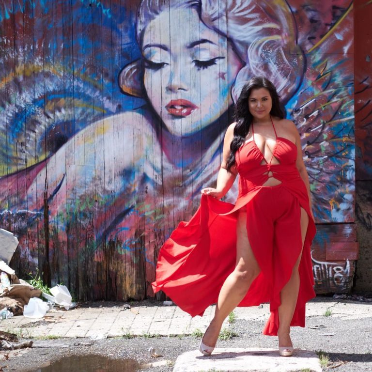 Plus Size Model Stephanie Mallick aka Bella Bombshel wearing a plus size red dress