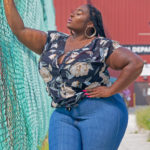 Plus size model Jezra Matthews (Jezra M) modeling plus size jeans from @fashionnovacurve and a plus size top