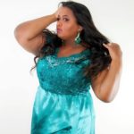 Kat Henry - Plus Size Model, Ms International Curve ‘17/18, Ms British Beauty Curve '15, Ridge Radio DJ,Blogger, Body Positive Activist - modeling a plus size teal dress by @jeanpat54