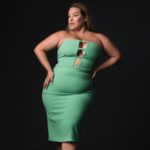 Laura Lee a plus size model wearing a plus size green dress by @csiriano