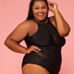 Kat Henry - Plus Size Model, Ms International Curve ‘17/18, Ms British Beauty Curve '15, Ridge Radio DJ,Blogger, Body Positive Activist - modeling a plus size black single piece swimsuit by @sierra_blu_fashion