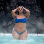 Plus Size Model Tabria Majors wearing a plus size two piece blue swimsuit by @prettylittlething