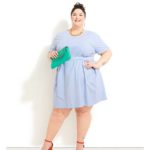 Plus size model Faith Costa (Faith PlusFashion) wearing a plus size light blue dress